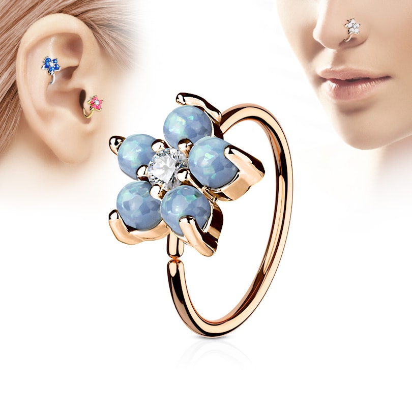 Ring met bloem van opaalsteentjes