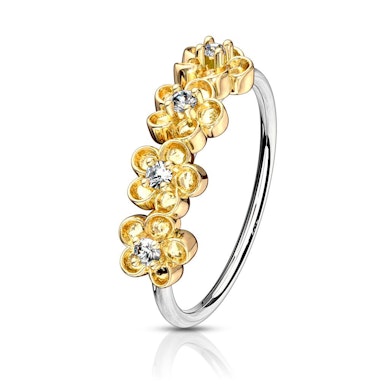 Ring met vier bloemen op een rij
