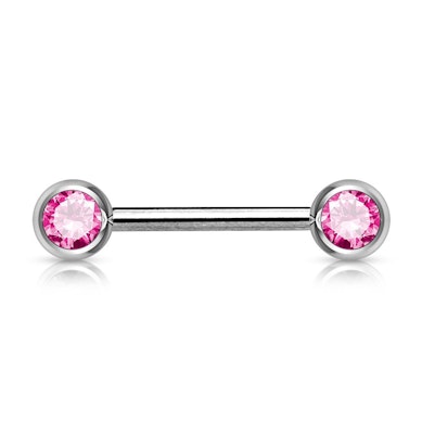 Tepelpiercing met steentjes in vele kleuren.