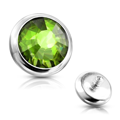 Dermal anchor disk in verschillende kleuren.