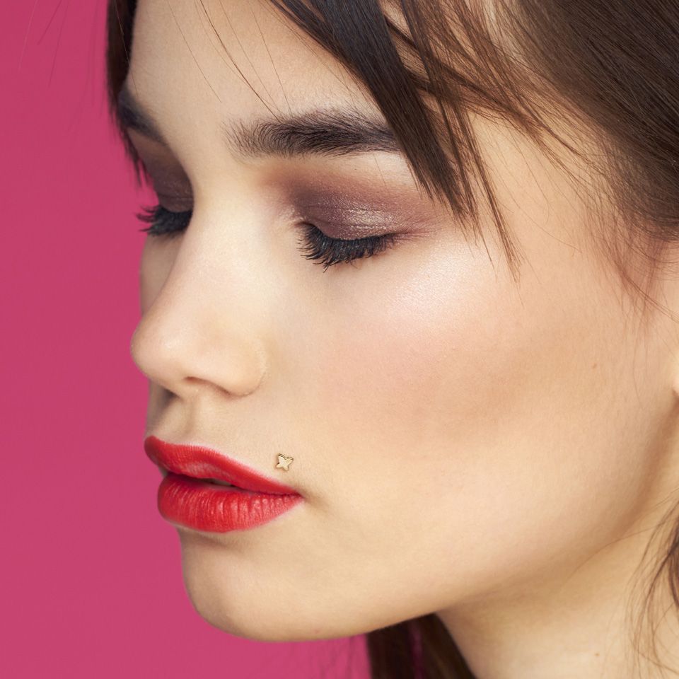 Labret met vlinder uit 14 karaats goud met ptfe staaf