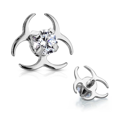 Dermal gevormd als een bio hazard symbool met steentje