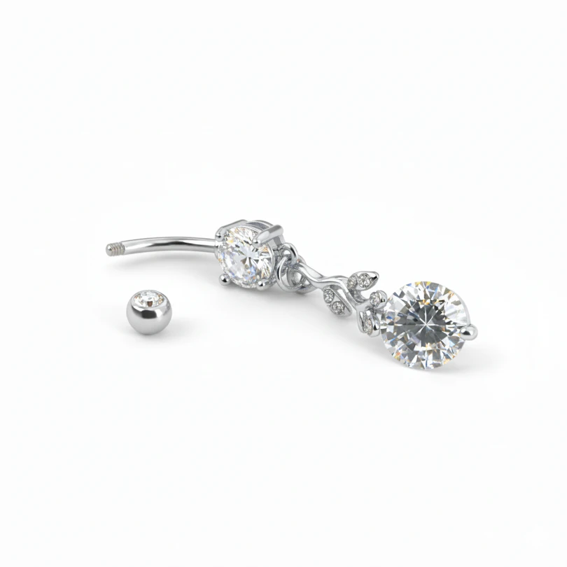 Navelpiercing met hangend takje en steentjes