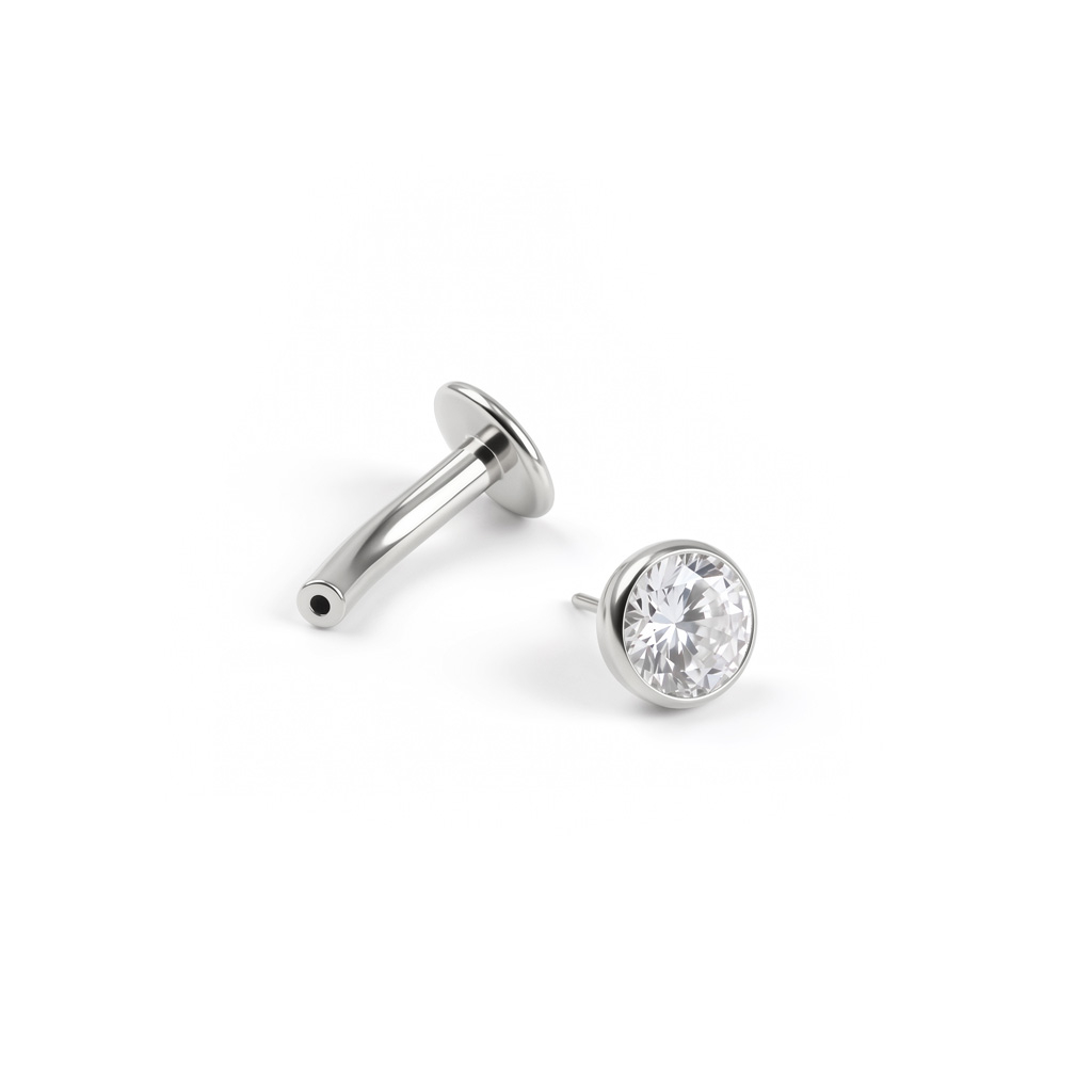 Zwevende navel piercing in titanium