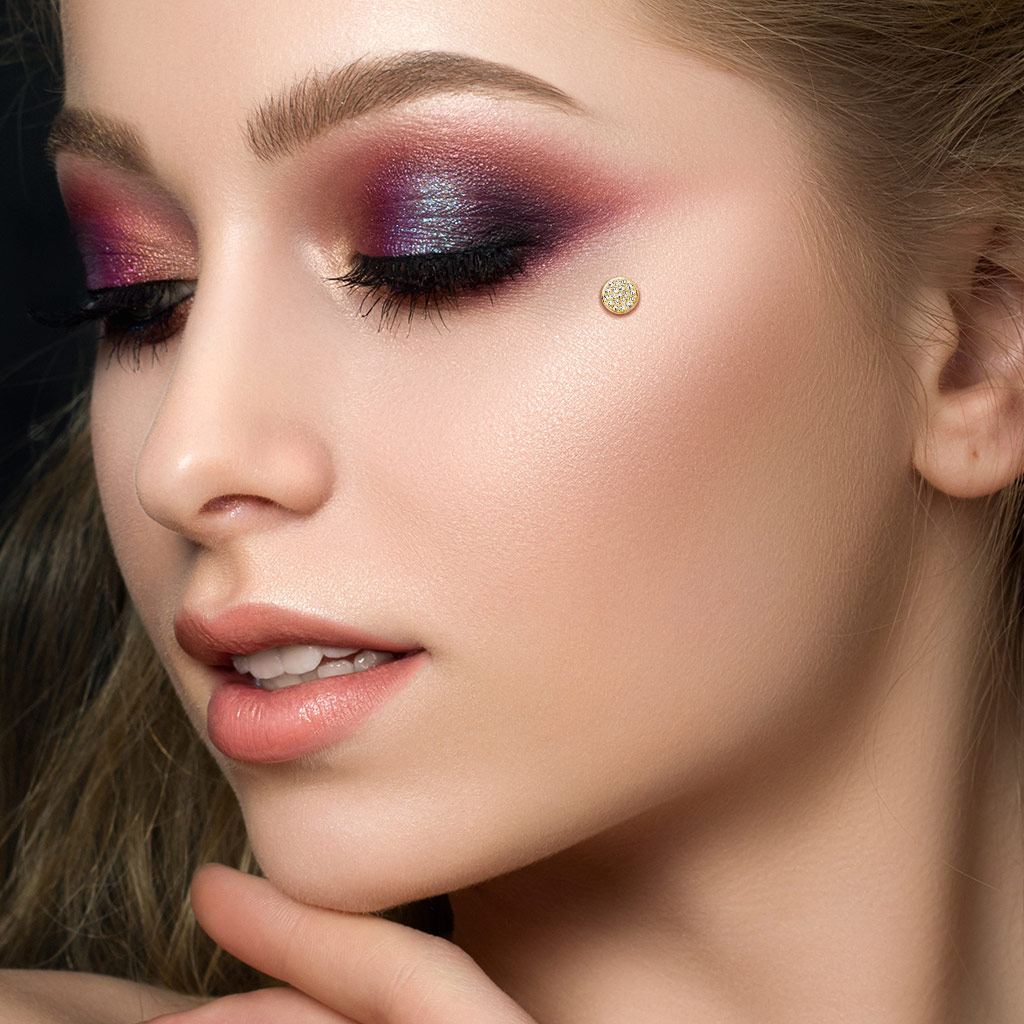 Dermal van 14 karaats goud met steentjes in een koepel