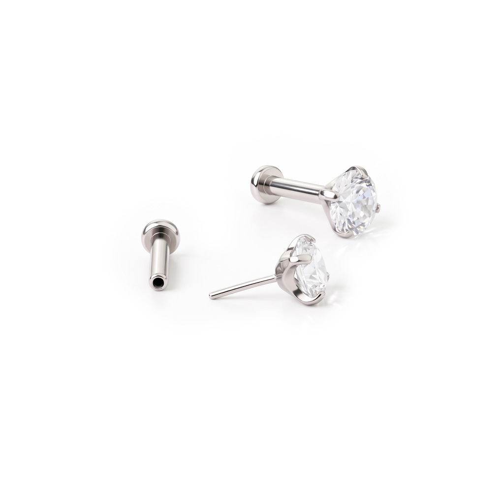 Titanium push-in labret met steentje in tandzetting