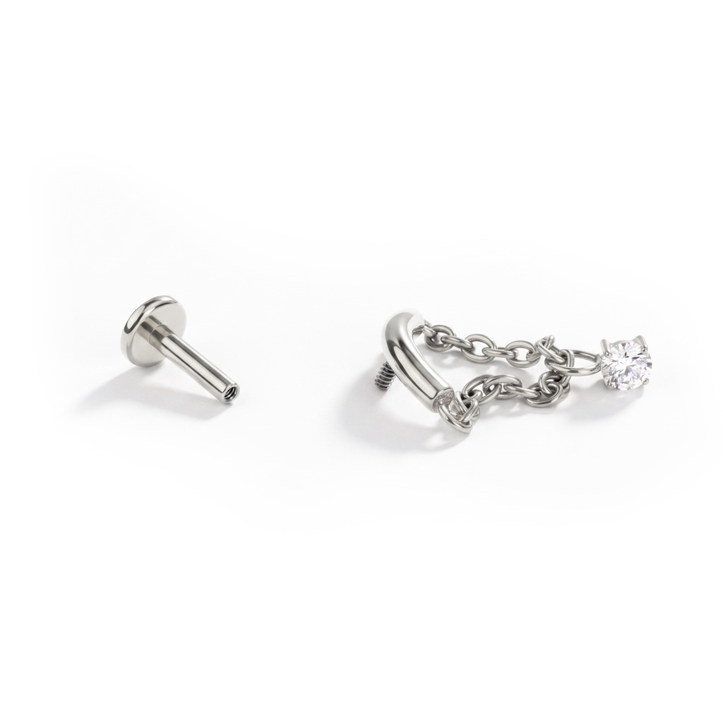 Labret met gebogen staafje, kettinkje en hangertje