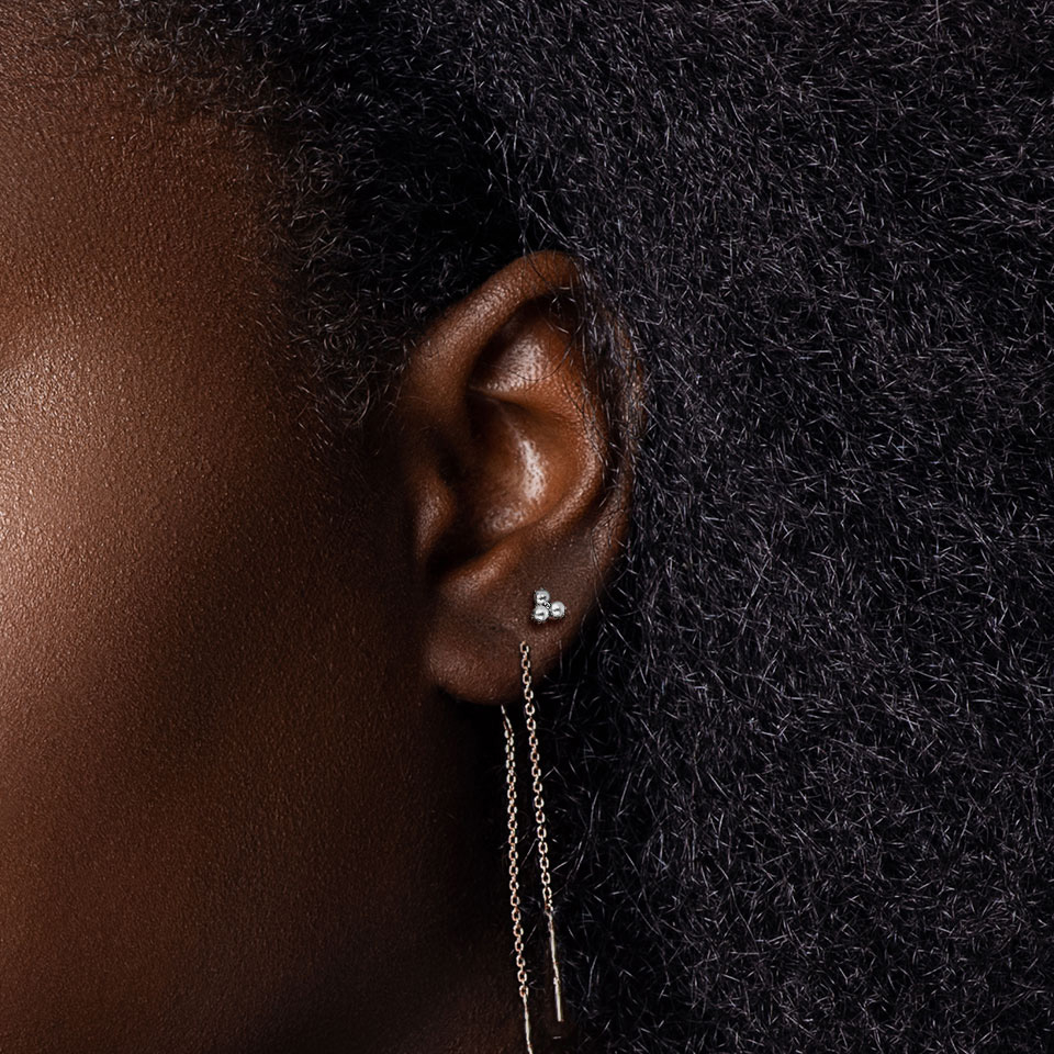 Elegante labret met trio synthetische parels