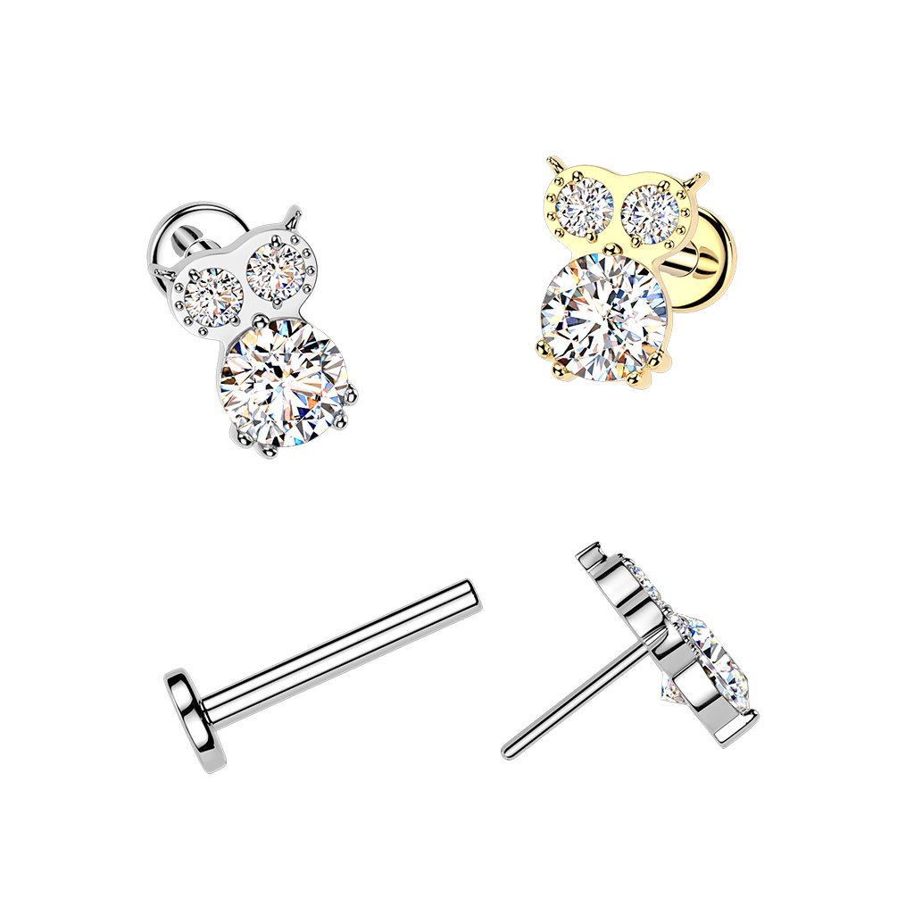 Titanium labret in uilvorm met steentjes