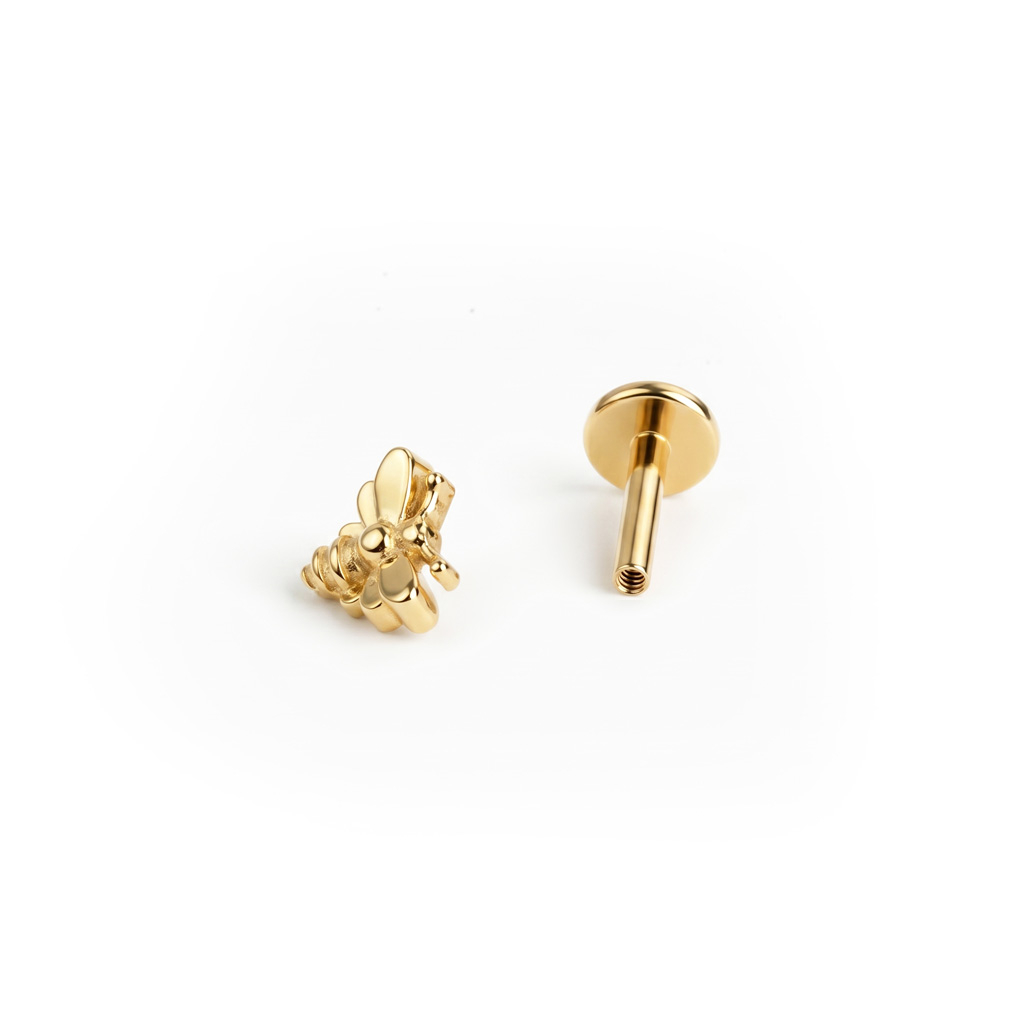 Bijenlabret van titanium