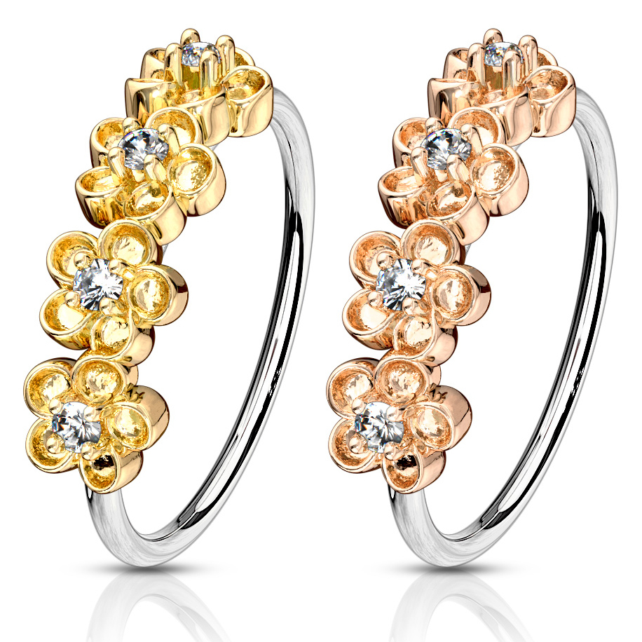 Ring met vier bloemen op een rij