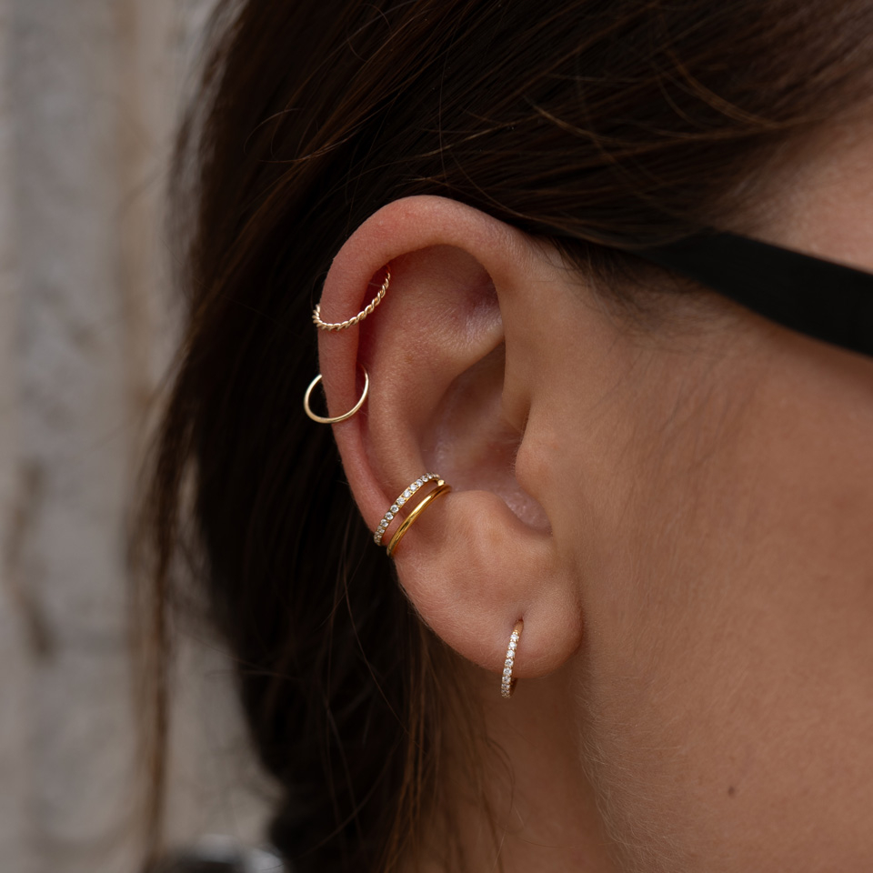 Eenvoudige getordeerde ring uit 14 karaats goud