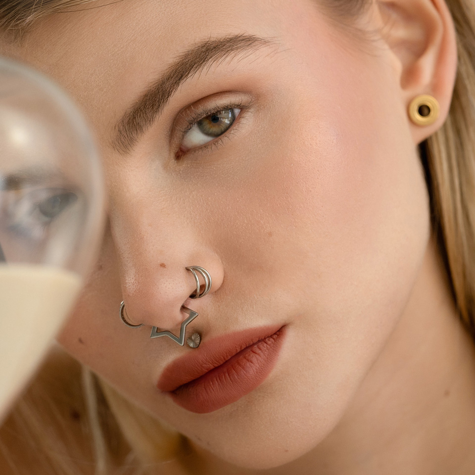 Stervormige titanium clicker ring